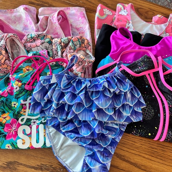Girls Bathing Suits Set of 7
Size 6-8 - Picture 1 of 15